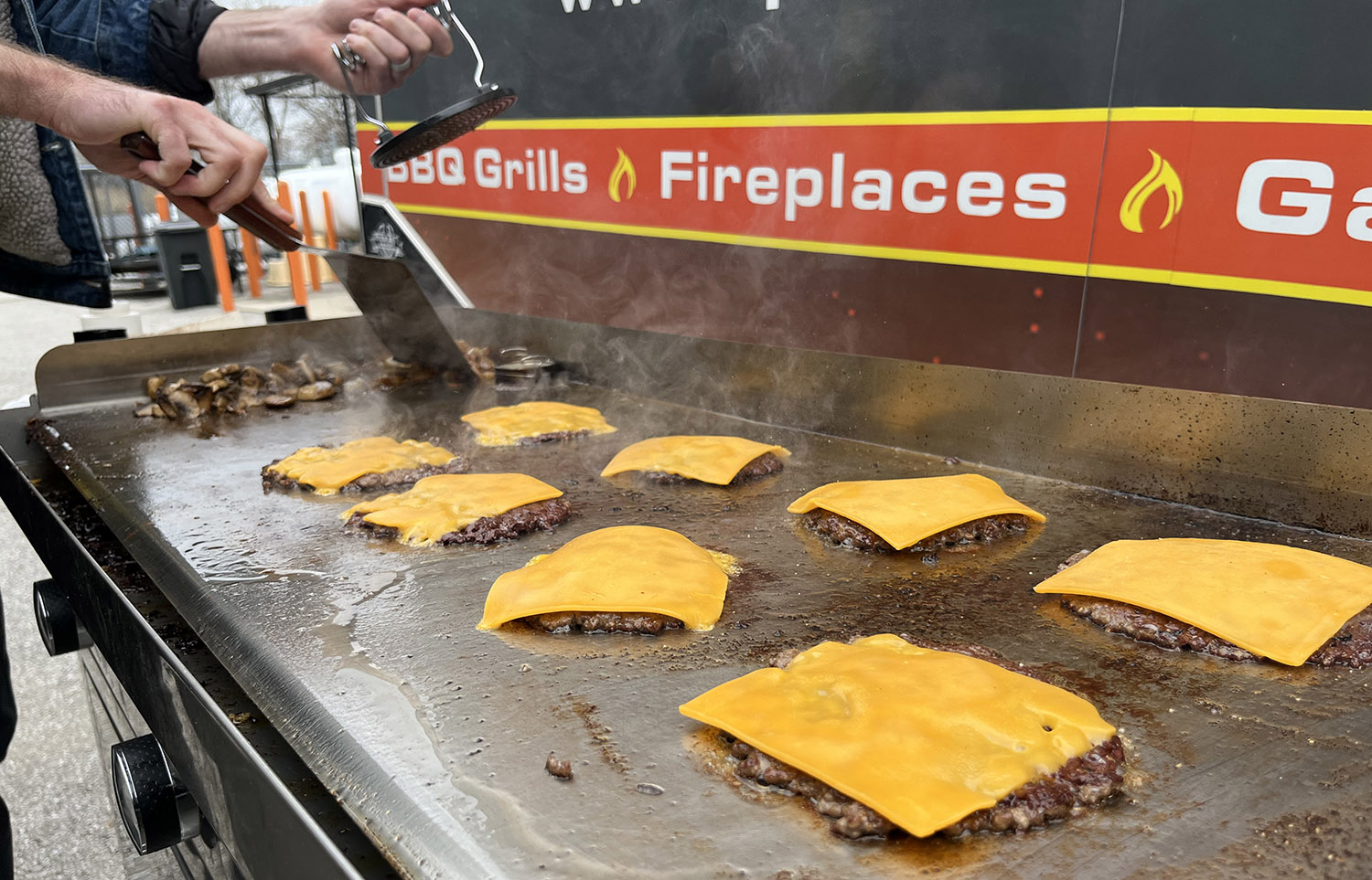 smashburgers on stainless steel griddle le griddle