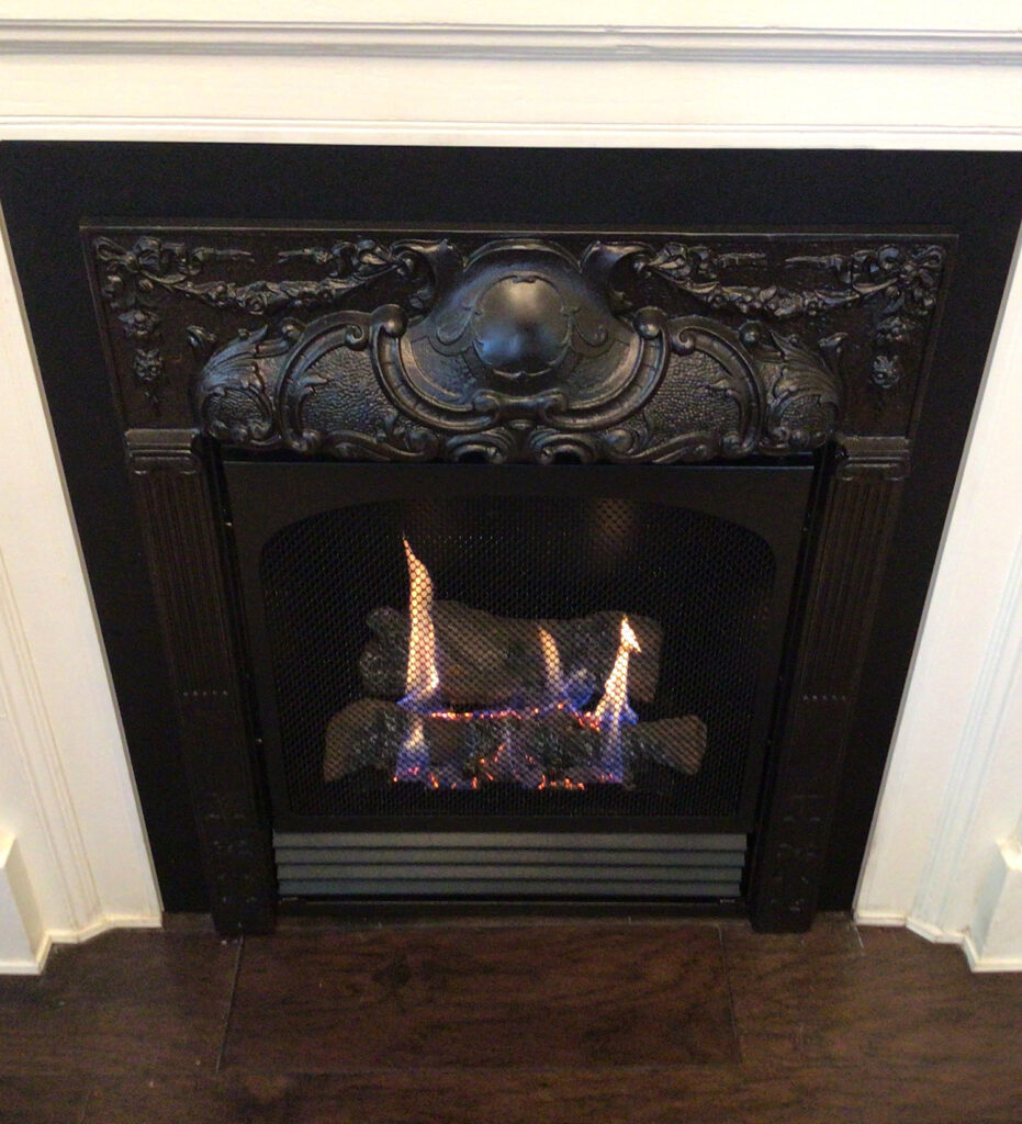 gas fireplace with antique surround