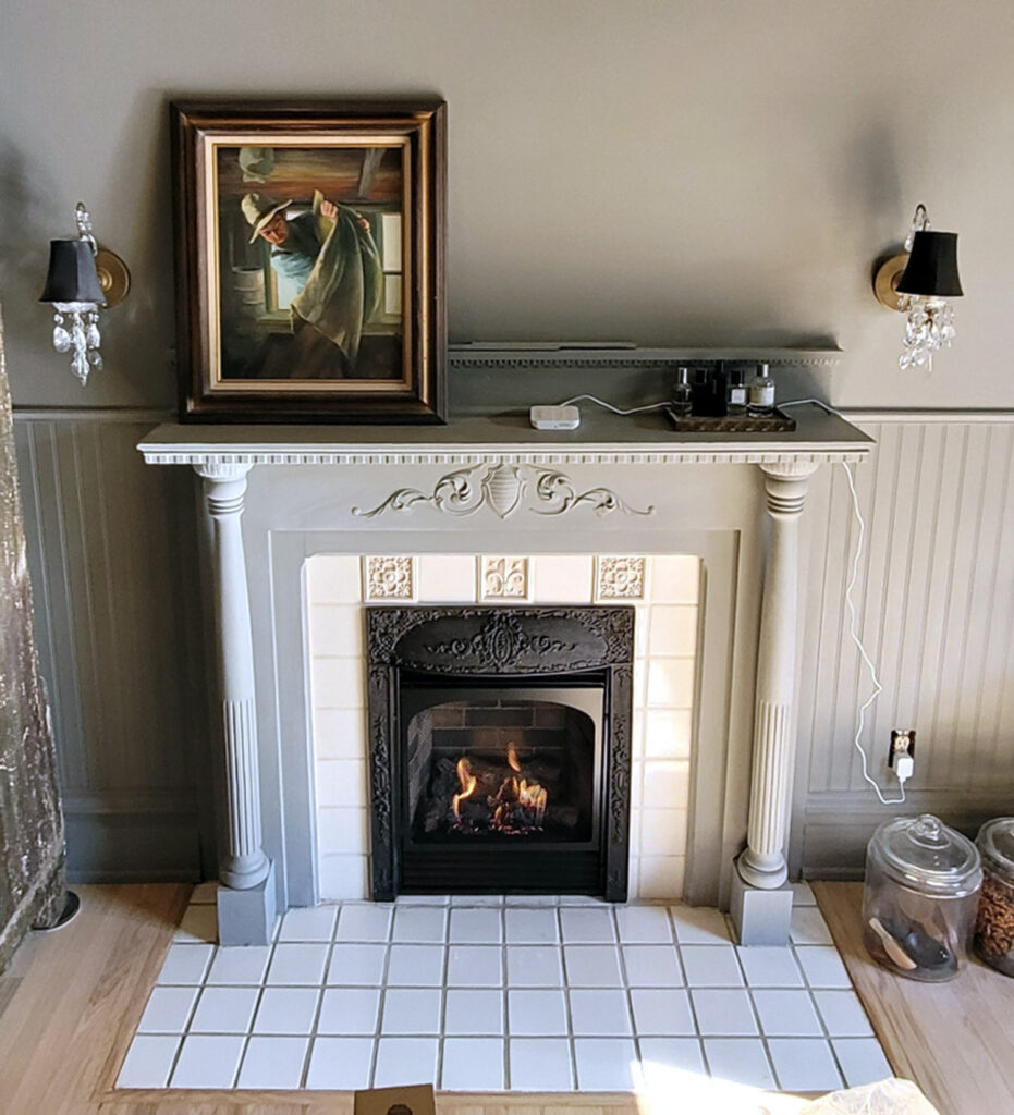 gas fireplace with antique front cover