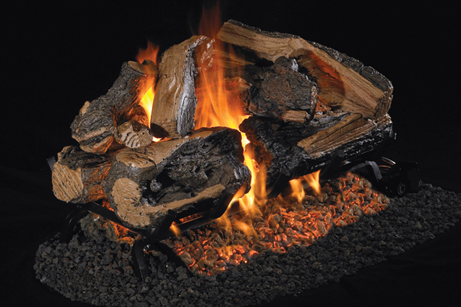 charred rugged split oak see thru gas fireplace logs