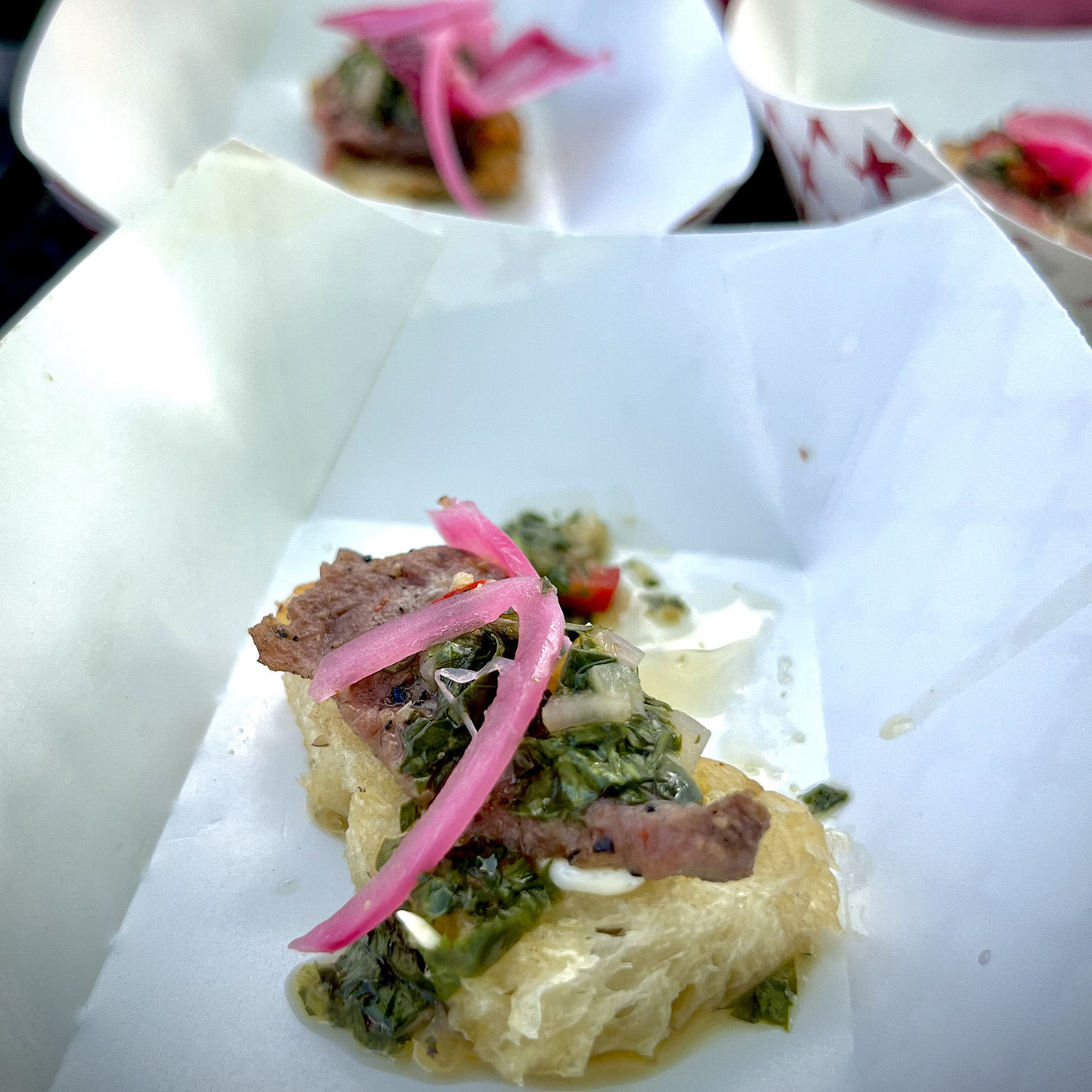 smoke and fire festival winner focaccia bread steak chimichurri and pickled red onions