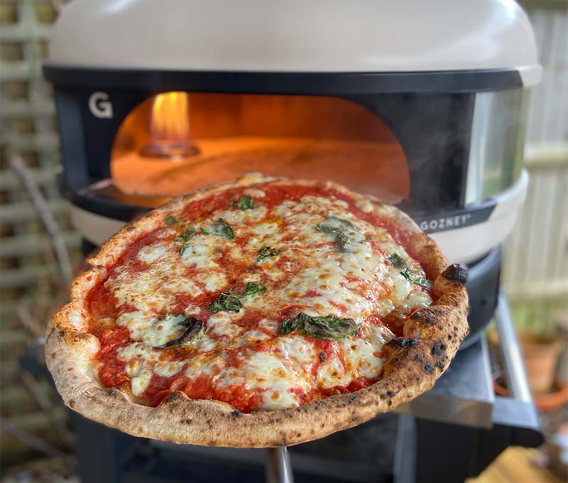 gozney pizza dome with margarita perfect pizza and cheesy 