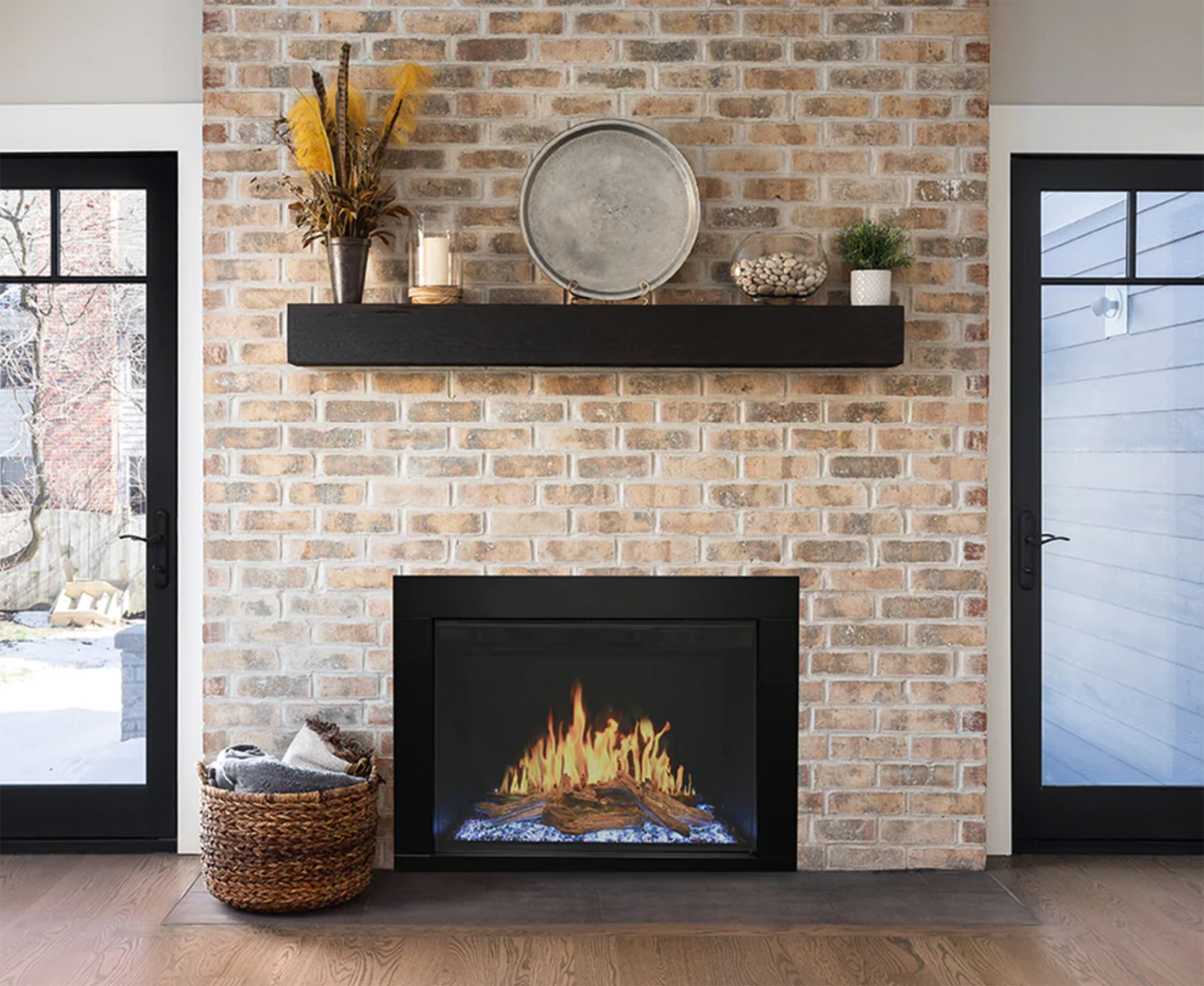 modern flames electric fireplace traditional with logs realistic look in living room with mantel above it and brick wall