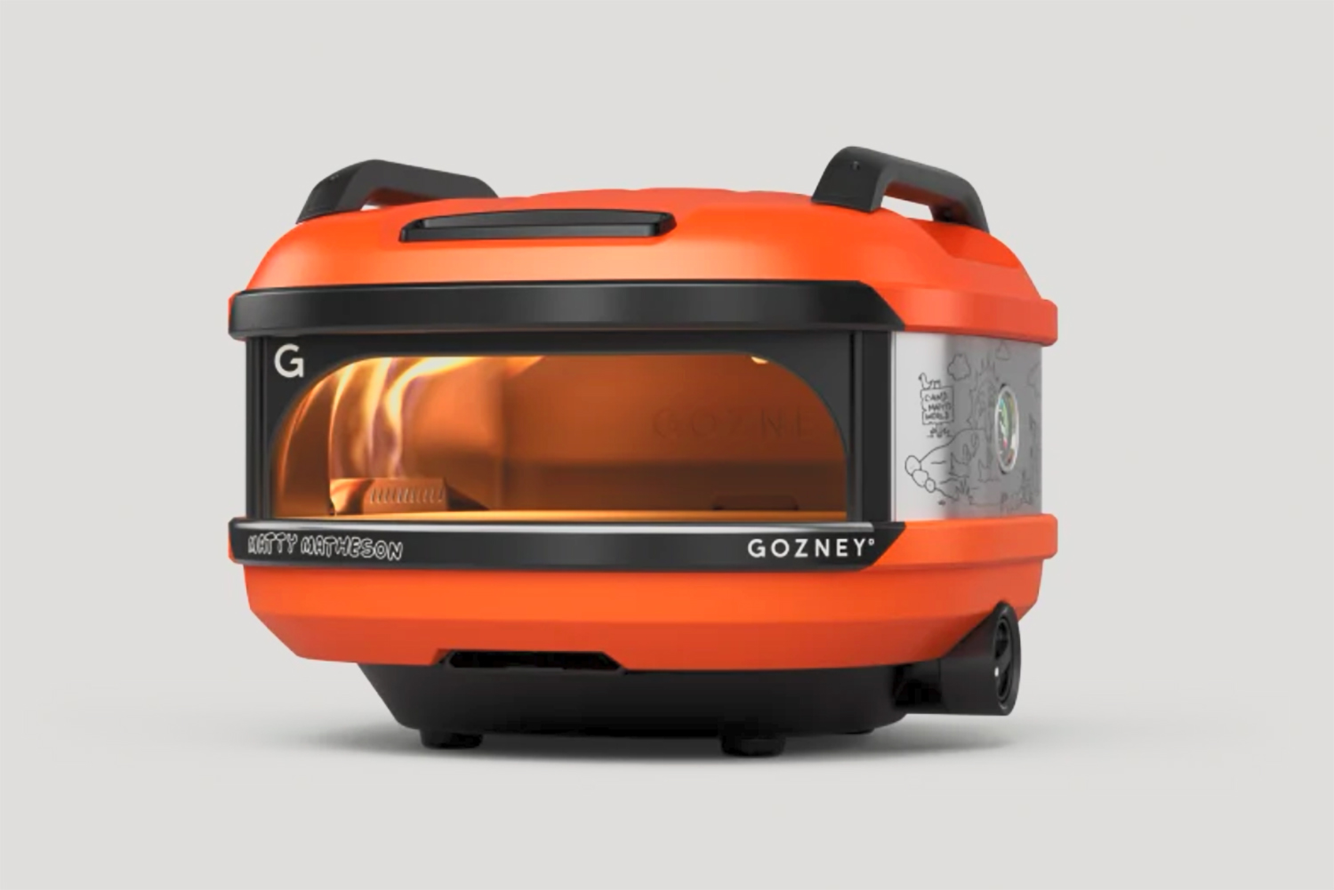 gozney tread portable pizza oven in orange matty matheson