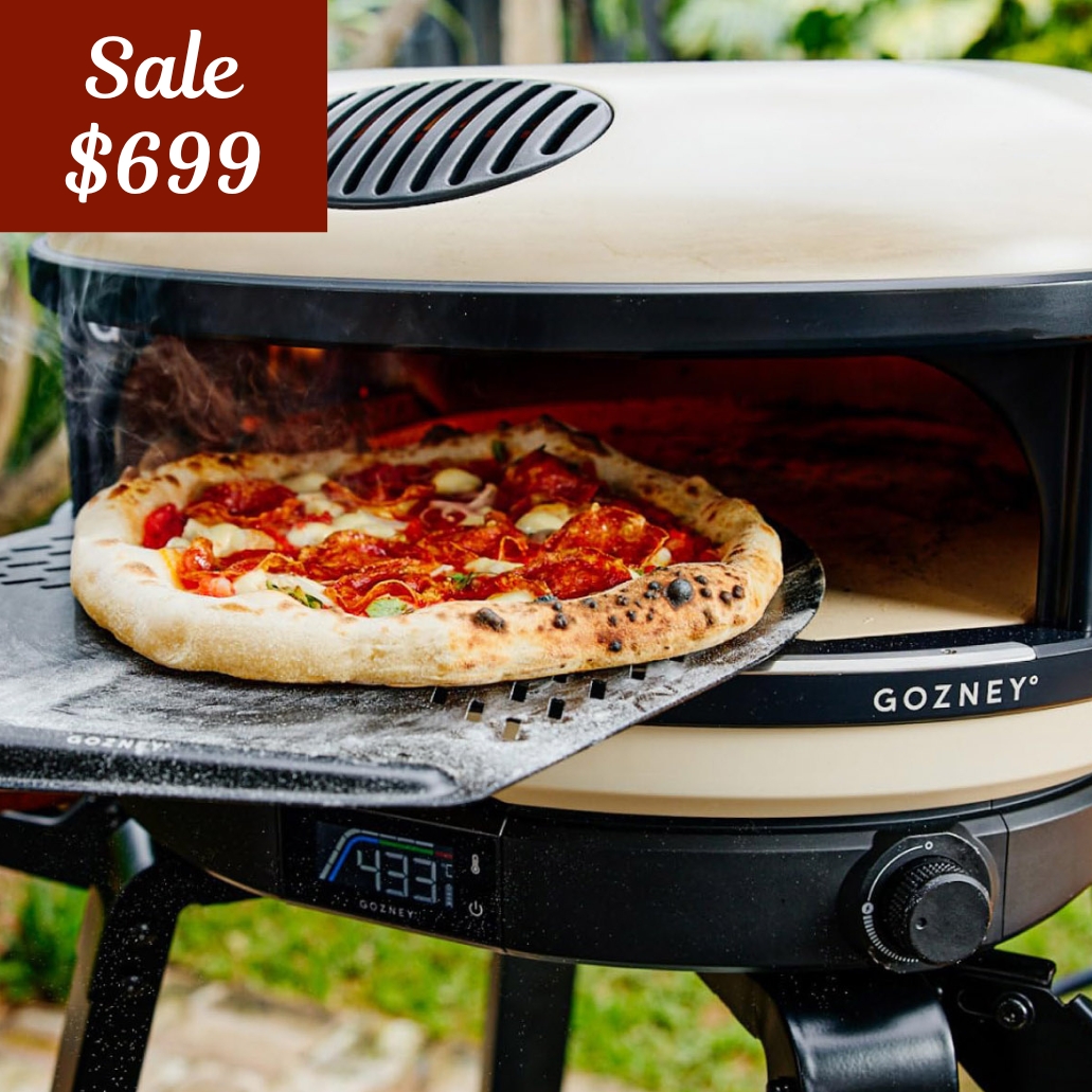 gozney arc pizza oven with pizza